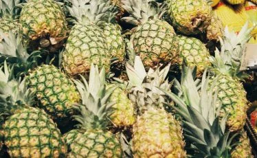 Exotic Fruit Monitor — exotic fruit on display in a retail store
